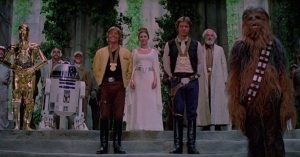 The throne room scene at the ending of Star Wars, with the characters lined up on the temple steps and Han and Luke wearing medals