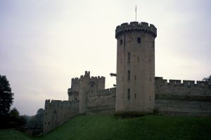 Warwick Castle, with thick walls and towers