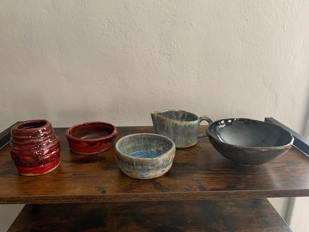 A row of chunky pottery. 